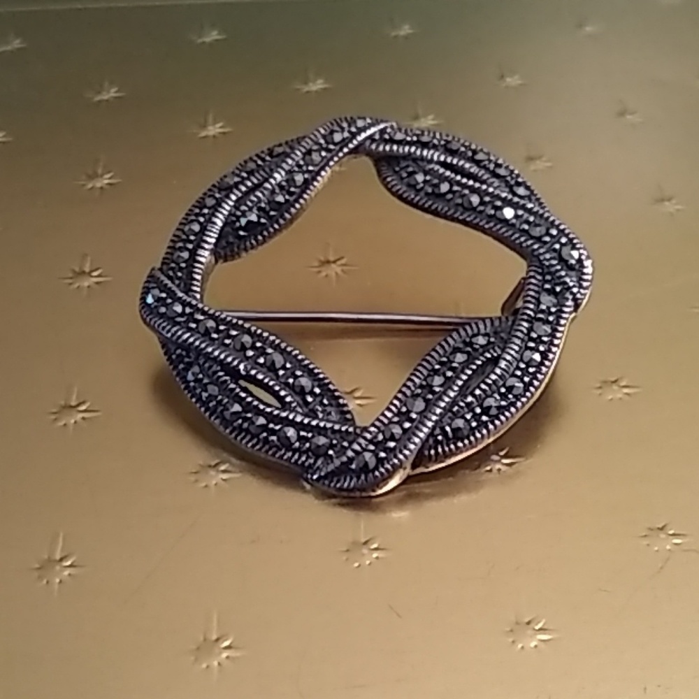 Sterling and marcasite circle brooch
